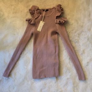 Blvd small sweater with cold shoulder detail.